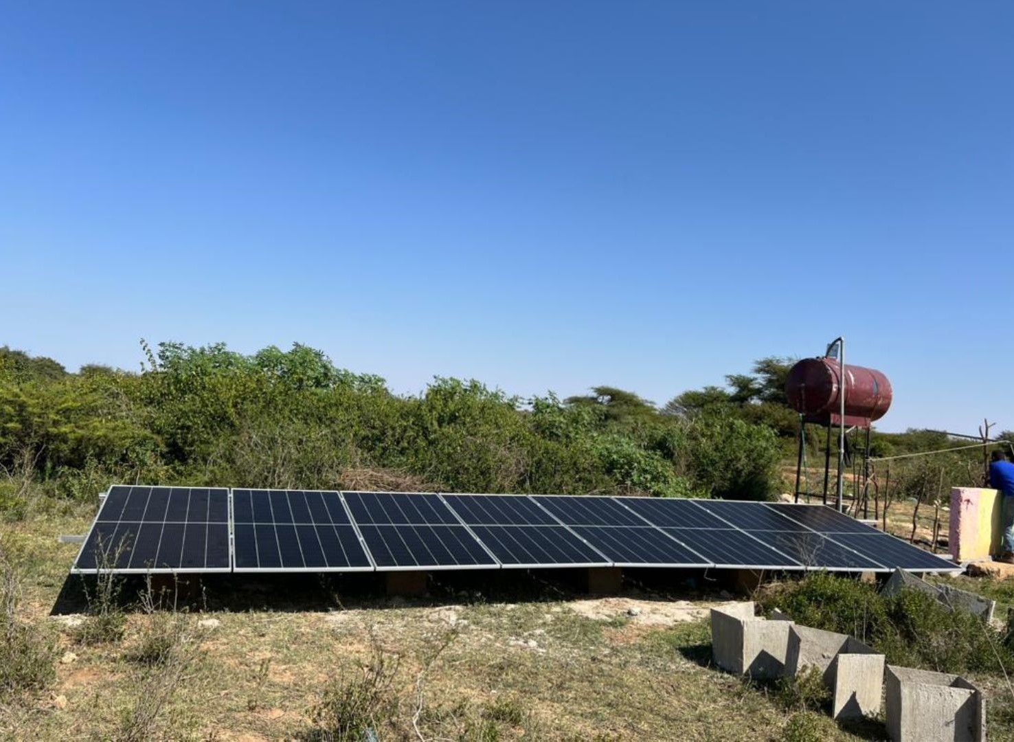 Solar panels powering agricultural pump